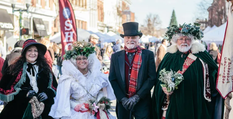 People posing for a picture at Dickens of a Christmas in Franklin, TN