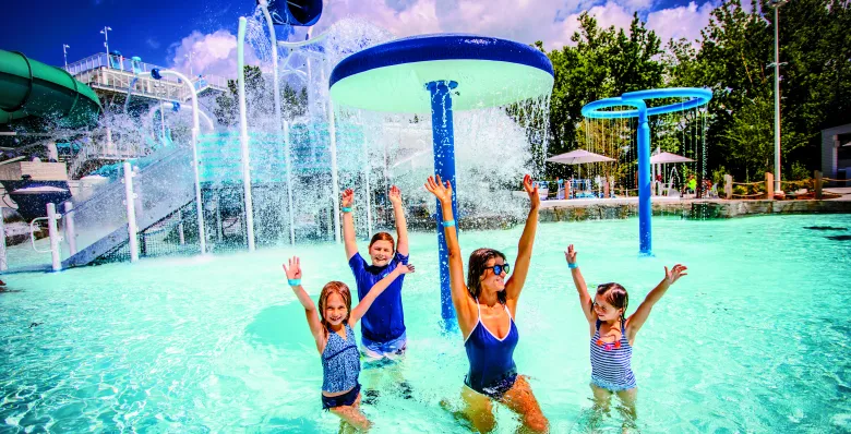 A family enjoys the outdoor waterpark at SoundWaves at Gaylord Opryland Resort &amp; Convention Center in Nashville, TN