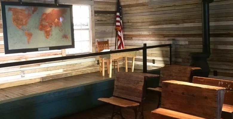 Benches and a map inside the one-room schoolhouse Tina Turner attended in Nutbush, Tennessee