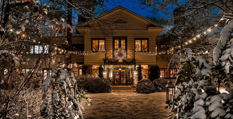 The cold new snow hangs heavy on branches, But waiting French doors hold out winter’s chill. A crackling fire burns to warm the soul. Welcome to RT Lodge in Maryville. Written about RT Lodge in Maryville, Tennessee.